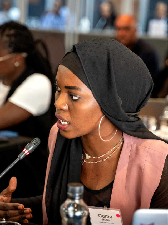 woman speaking to people