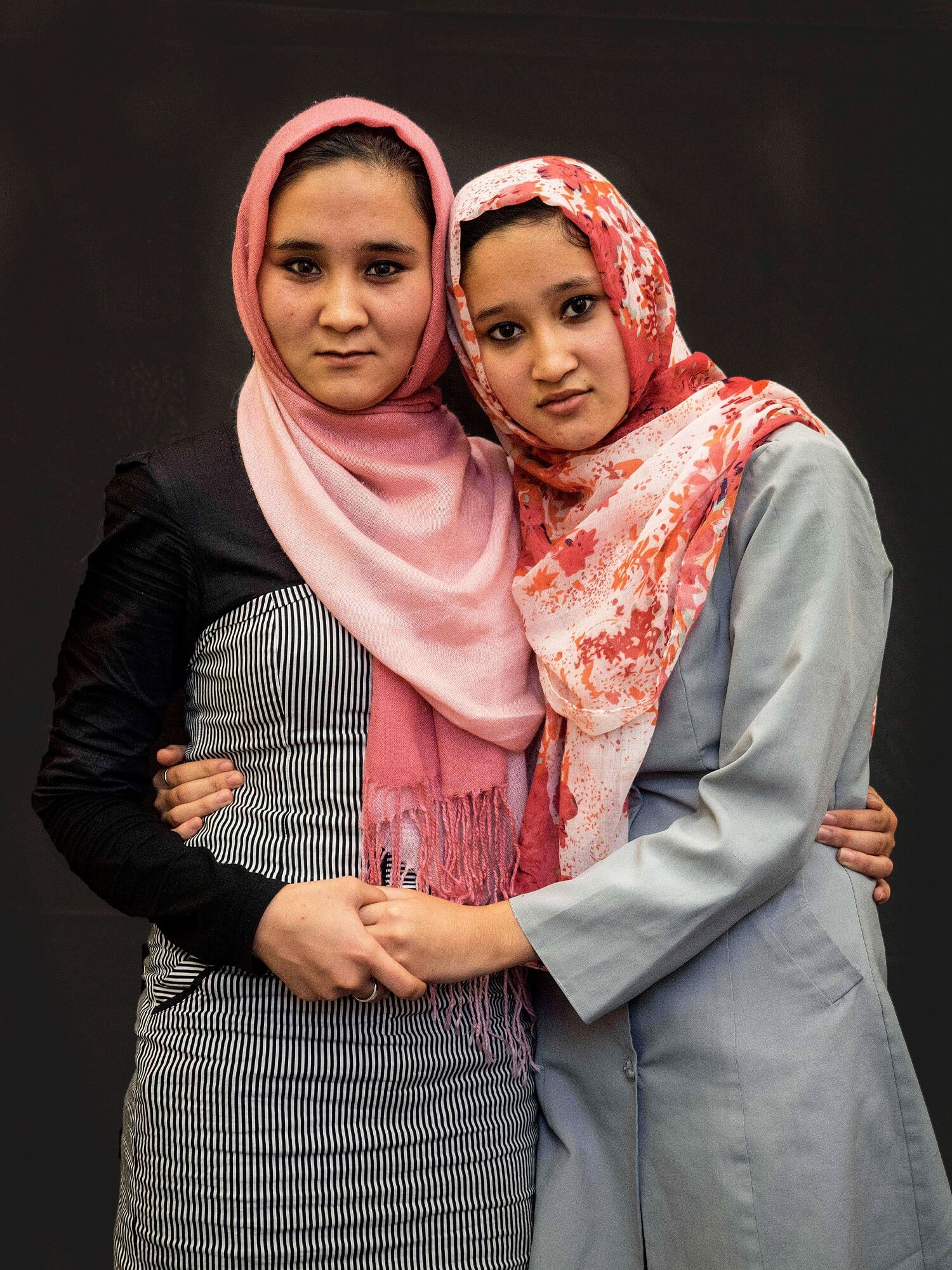 two women in support of each other